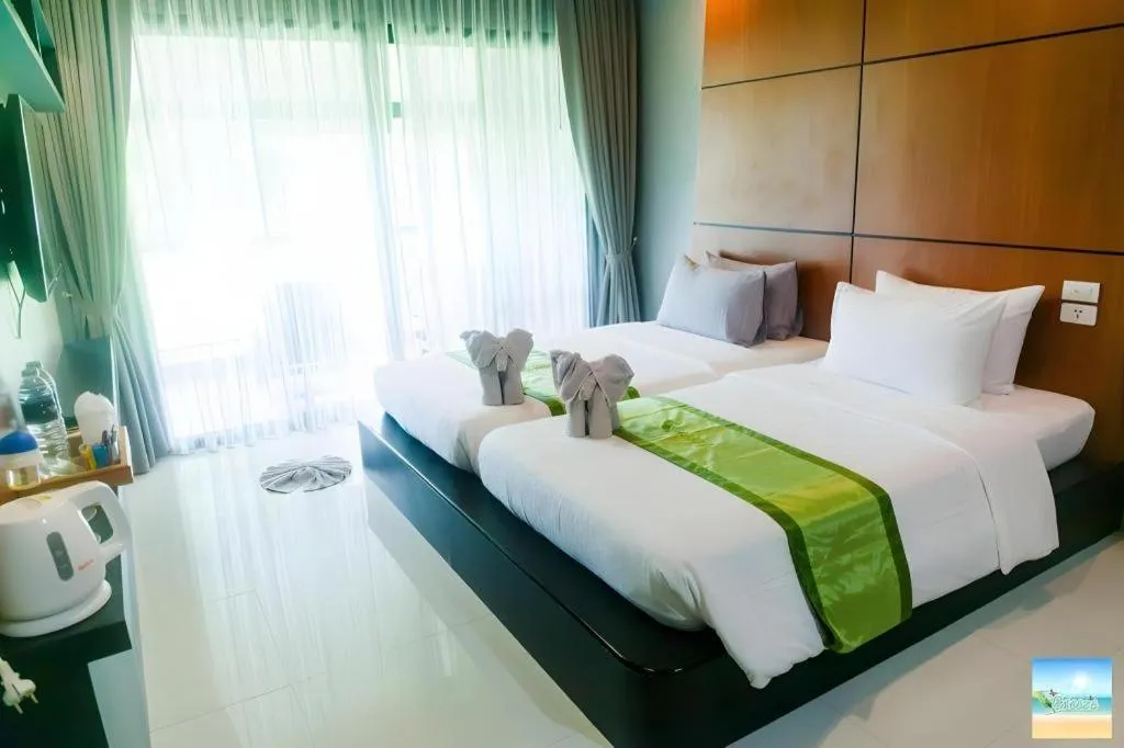 Bed in The Breeze Lipe Resort