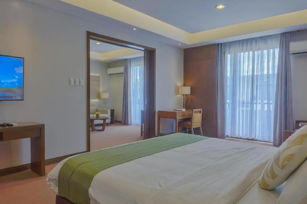 Bed in Mansion Garden Hotel