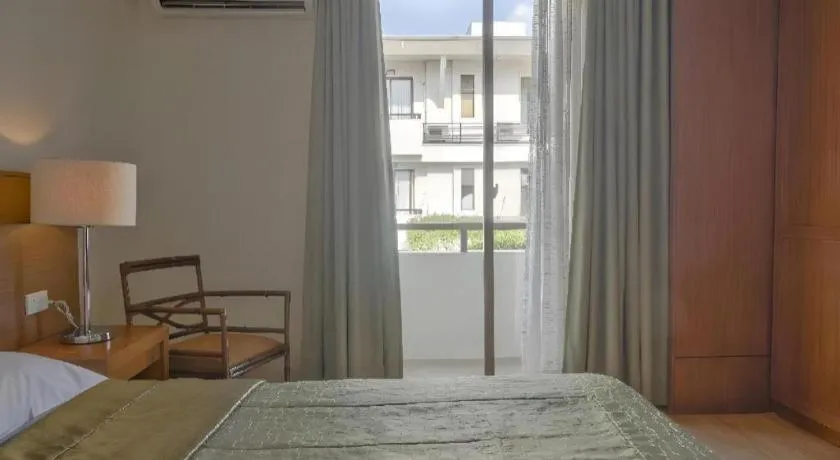 Bed in Mansion Garden Hotel