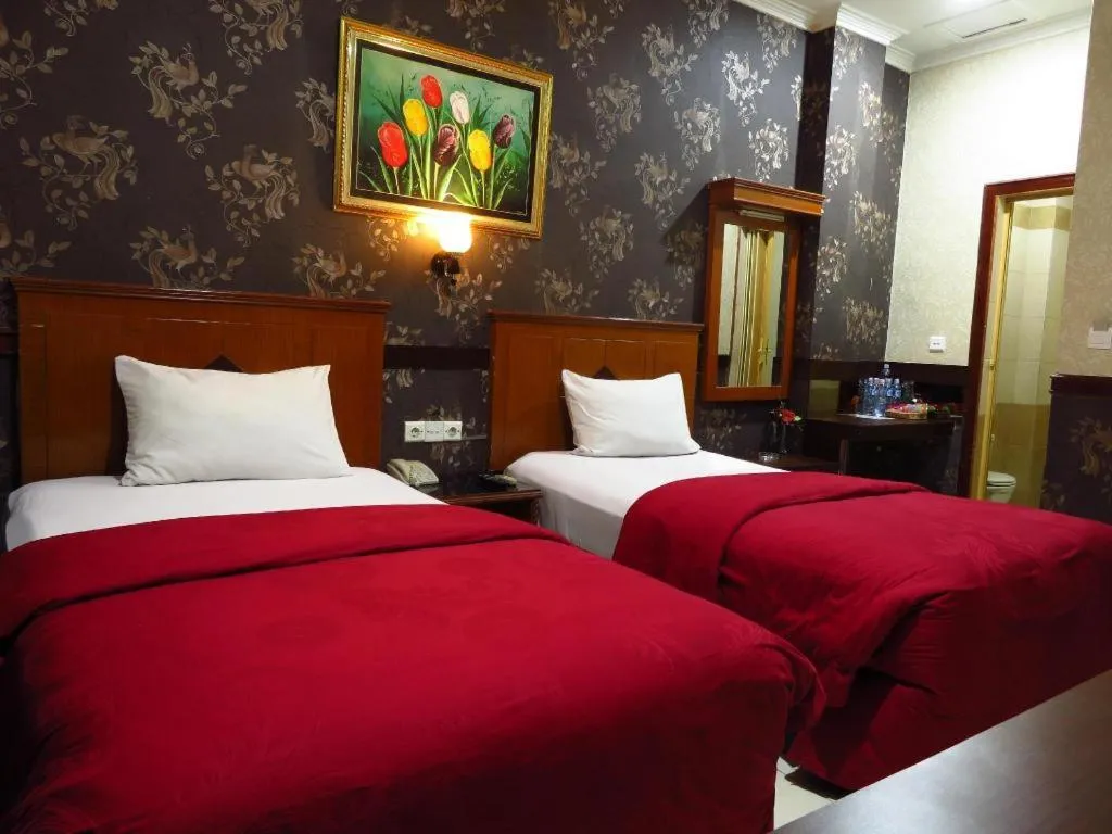 Bed in Hotel Menara Lexus