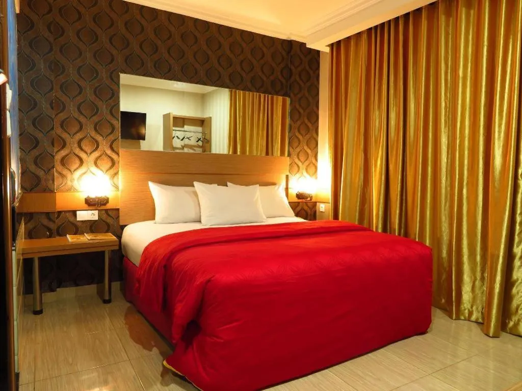 Bed in Hotel Menara Lexus