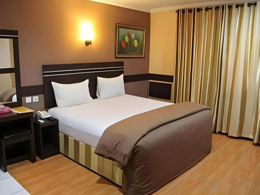 Bed in Hotel Menara Lexus