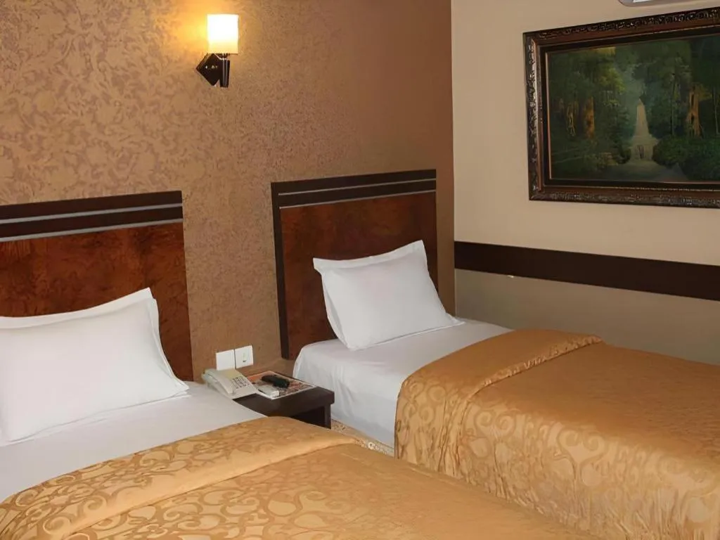 Bed in Hotel Menara Lexus