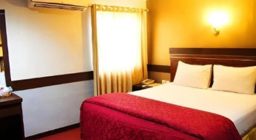 Bed in Hotel Menara Lexus