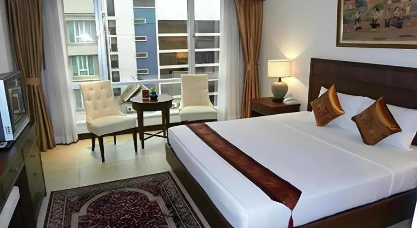 Bed in De Arni Hotel