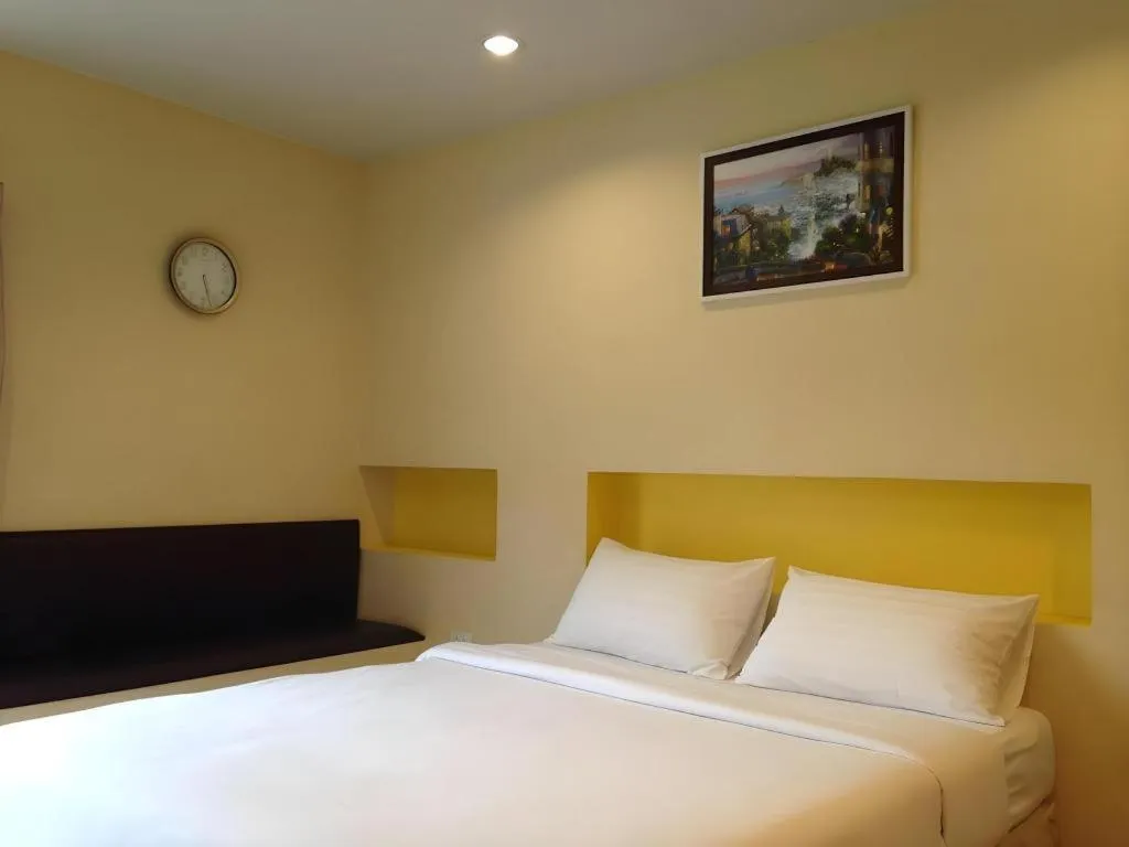 Bed in C2 Residence Hotel