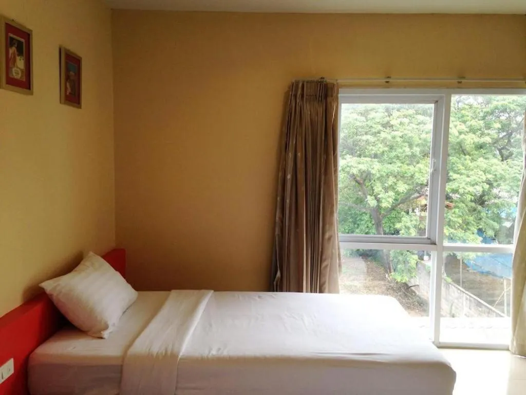 Bed in C2 Residence Hotel