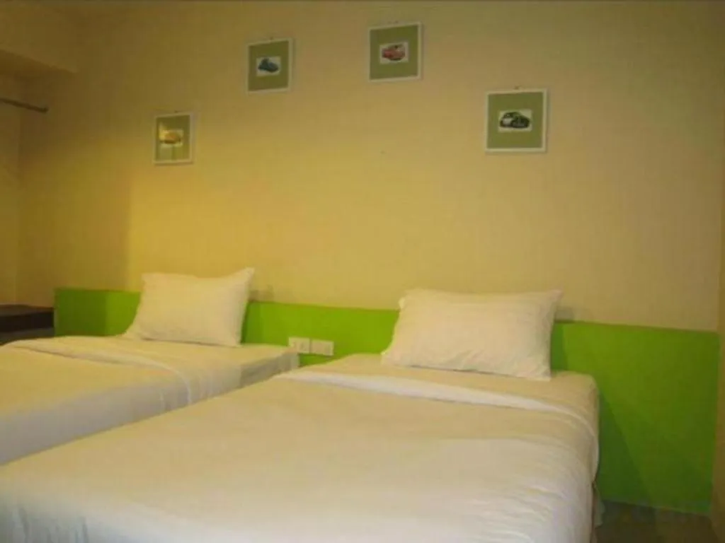 Bed in C2 Residence Hotel