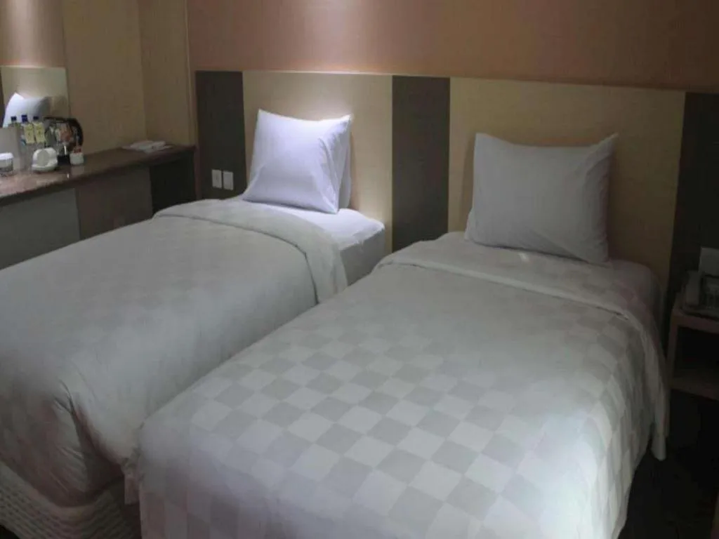 Bed in Dalton Hotel Makassar