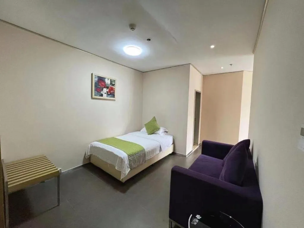 Bed in GreenTree Alliance Shenzhen Shekou Sea World Taizi Road Hotel