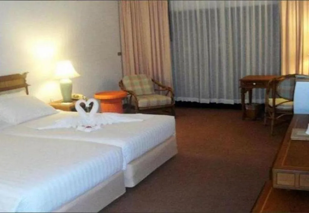 Bed in Imperial Golden Triangle Resort