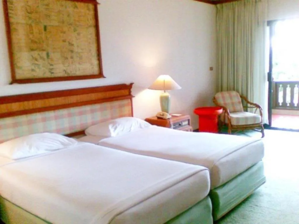 Bed in Imperial Golden Triangle Resort