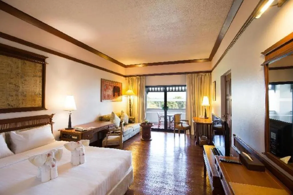 Bed in Imperial Golden Triangle Resort