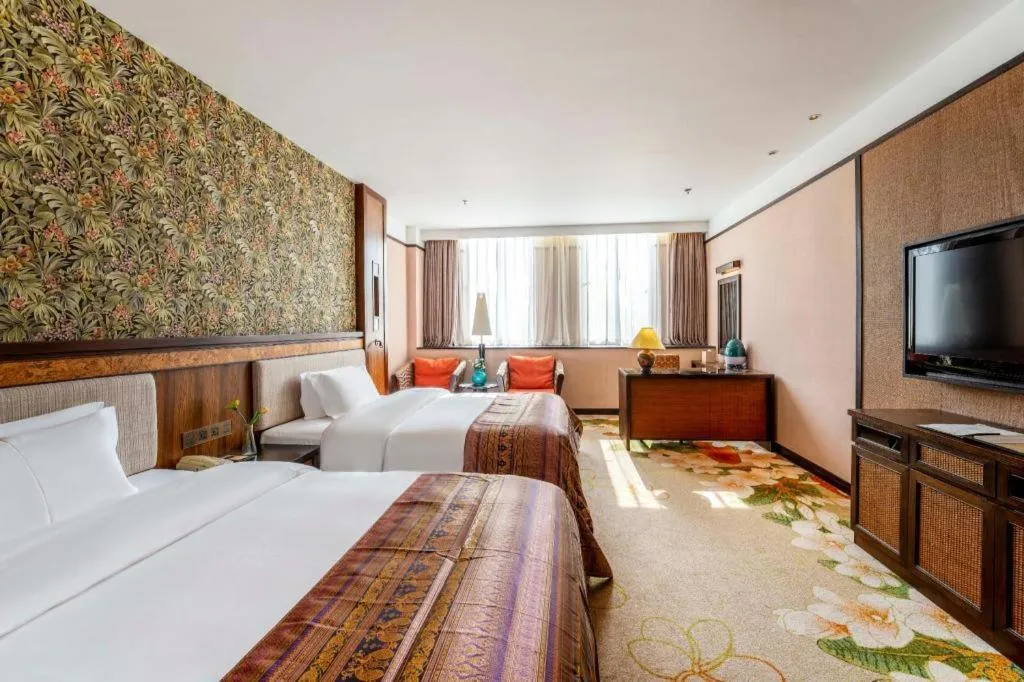 Bed in Riyuegu Hotsprings Resort