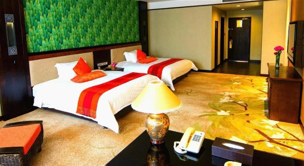 Bed in Riyuegu Hotsprings Resort