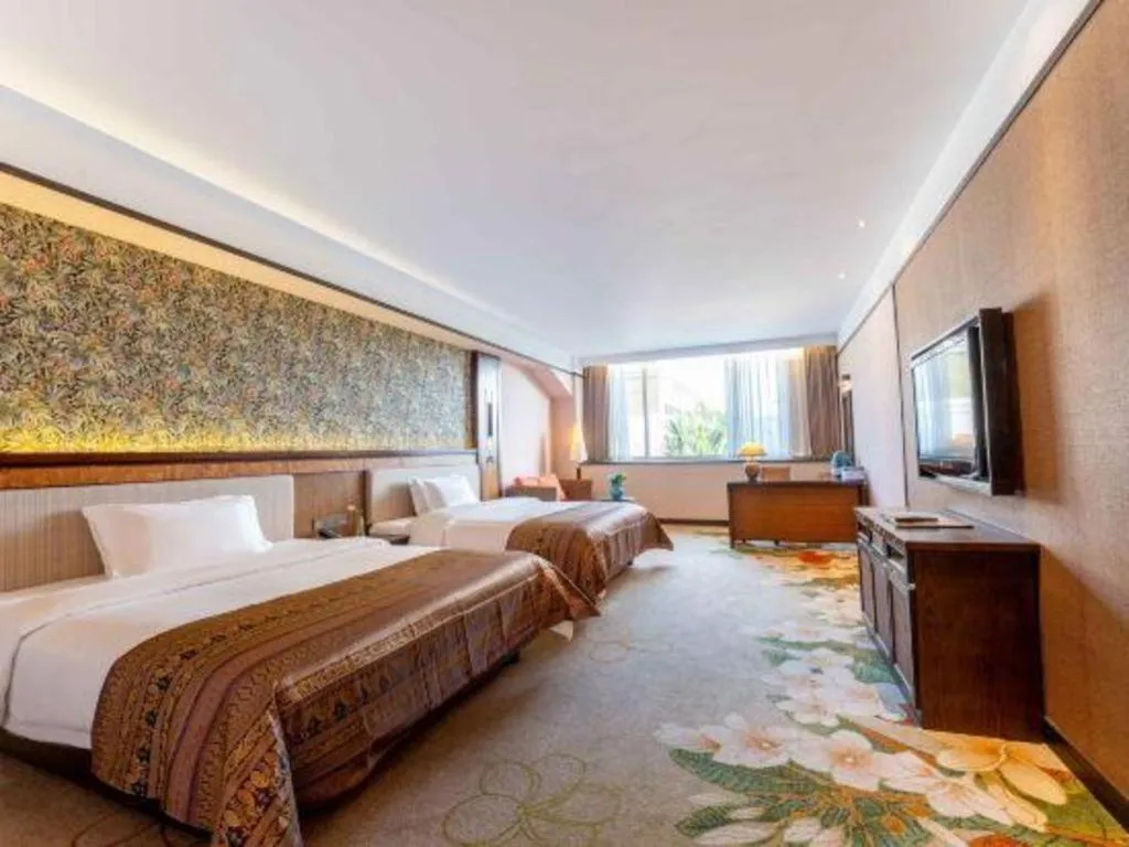 Bed in Riyuegu Hotsprings Resort