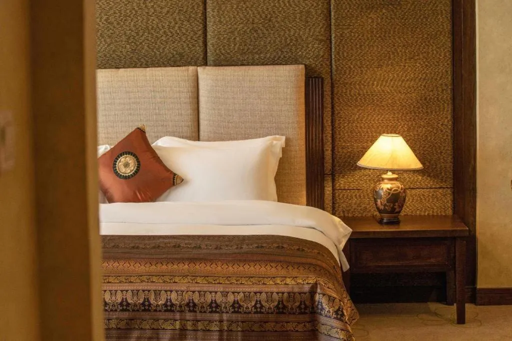 Bed in Riyuegu Hotsprings Resort