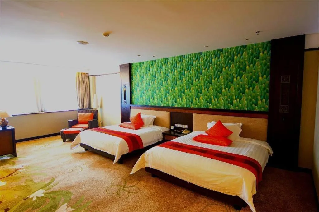 Bed in Riyuegu Hotsprings Resort