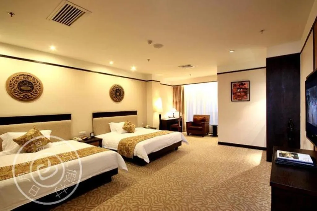 Bed in Riyuegu Hotsprings Resort