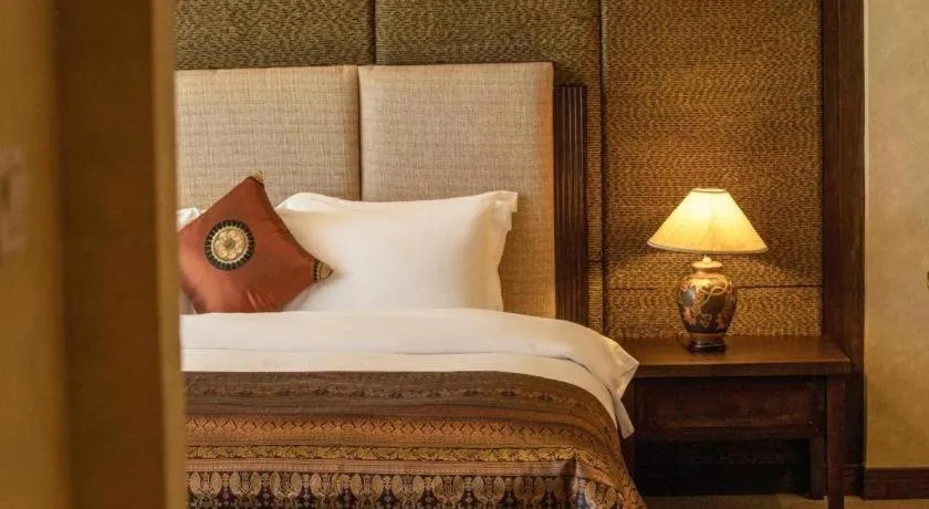 Bed in Riyuegu Hotsprings Resort