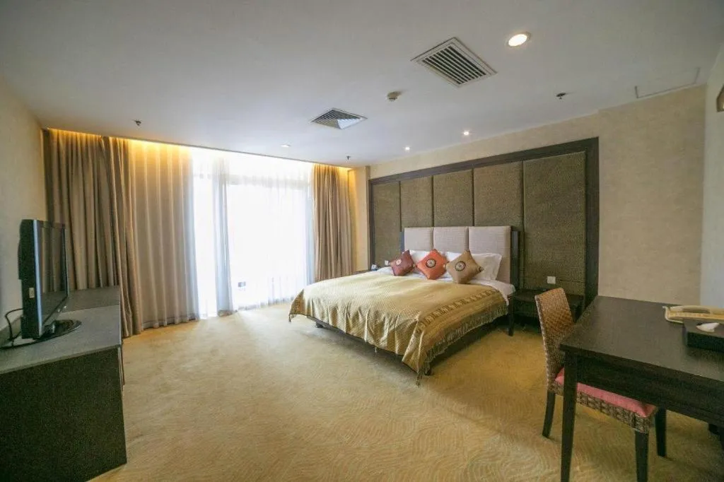 Bed in Riyuegu Hotsprings Resort