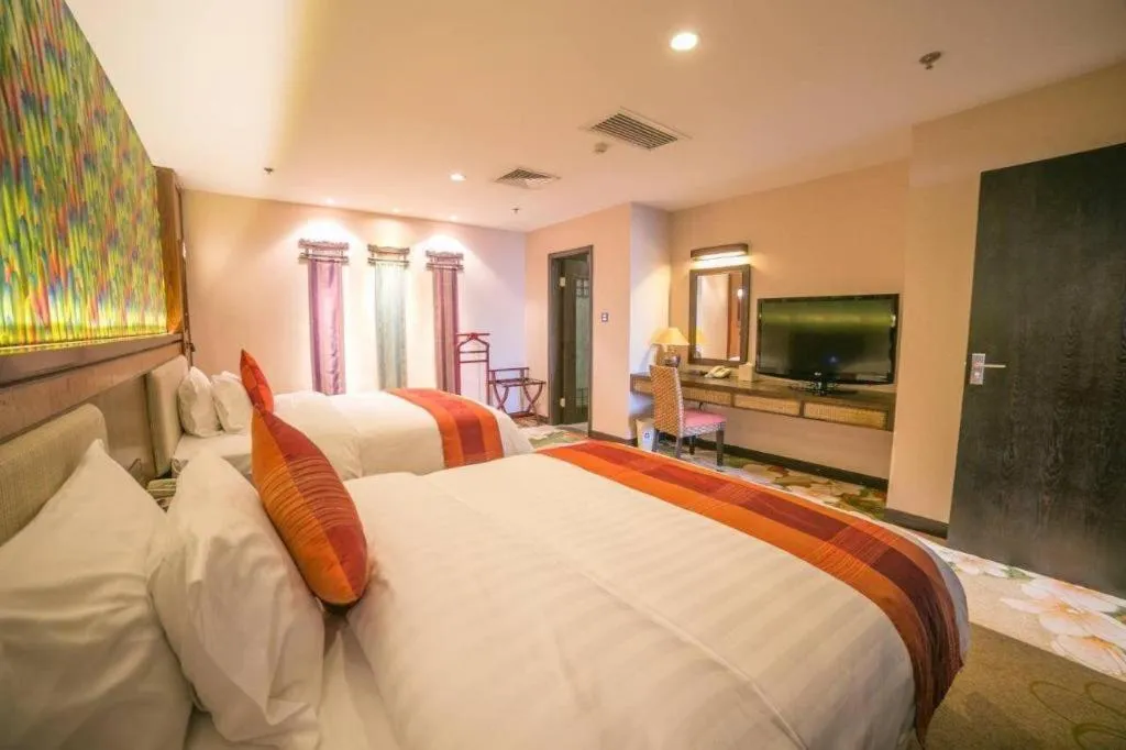 Bed in Riyuegu Hotsprings Resort