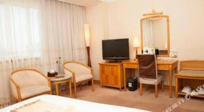 Bed in Xiamen Jingmin Central Hotel