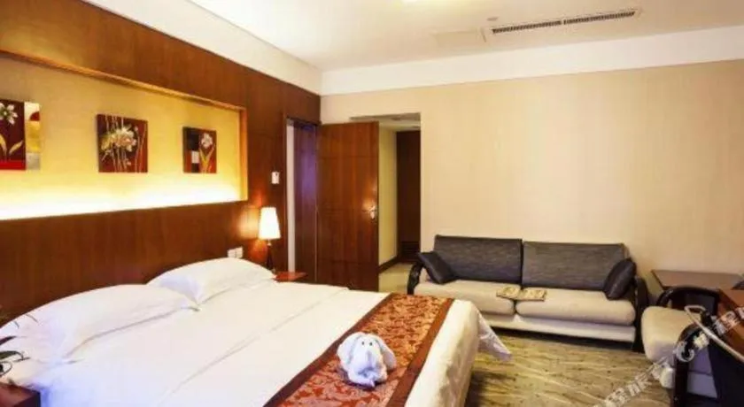 Bed in Xiamen Jingmin Central Hotel