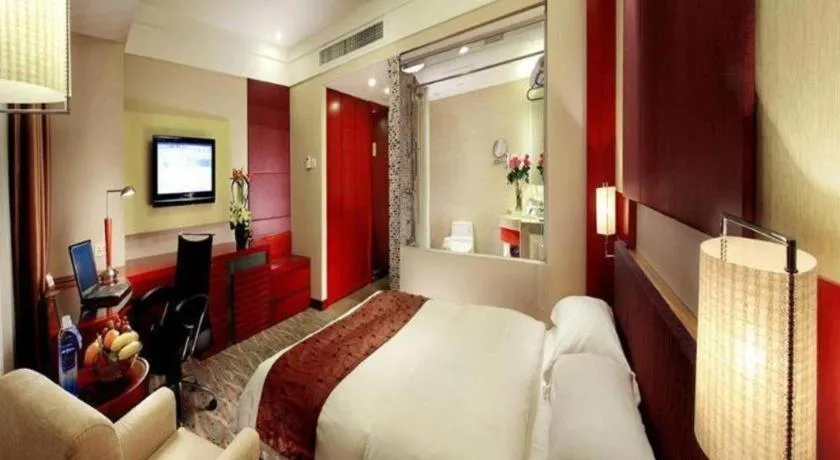 Bed in Xiamen Jingmin Central Hotel