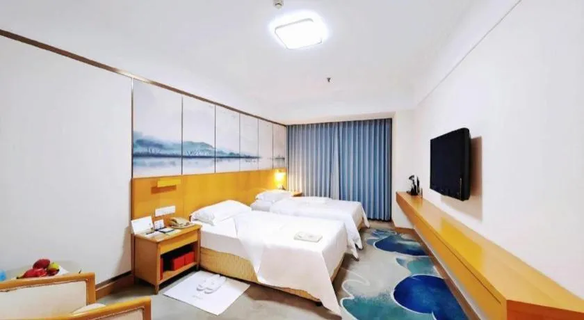 Bed in Xiamen Jingmin Central Hotel