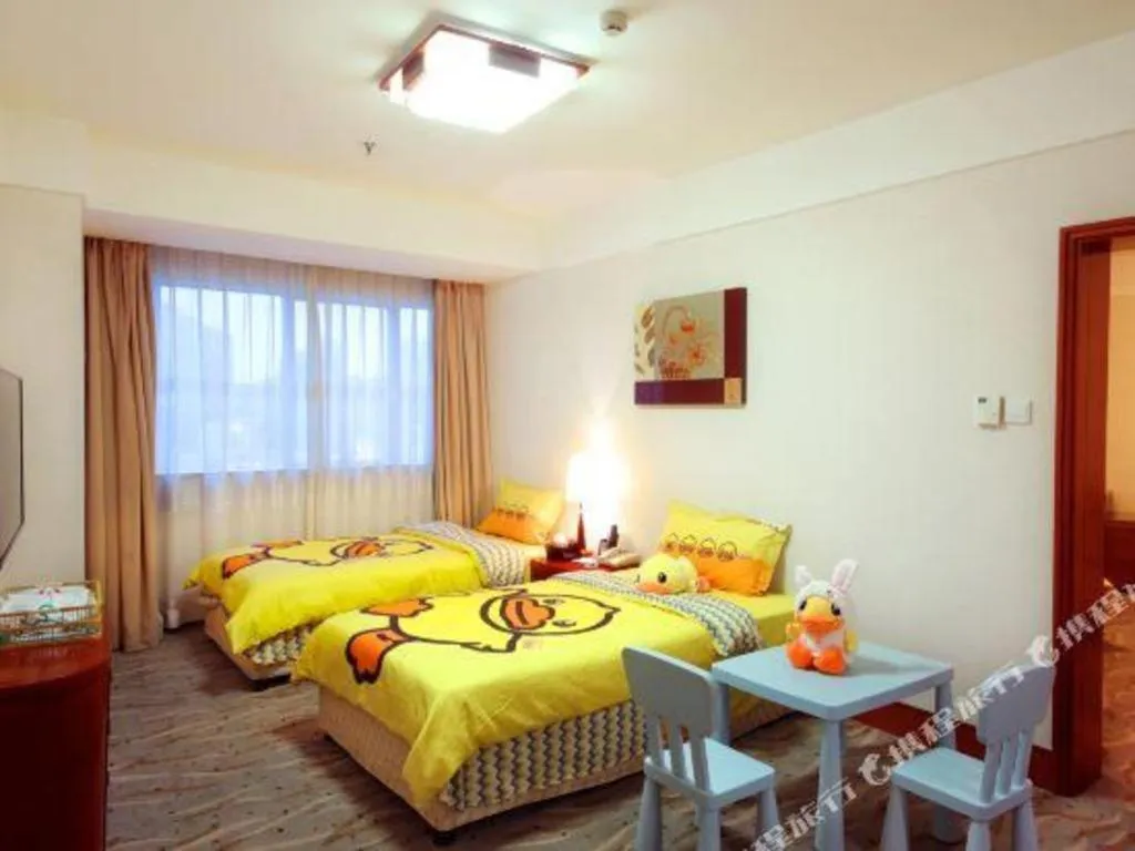 Bed in Xiamen Jingmin Central Hotel