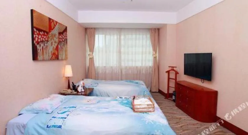 Bed in Xiamen Jingmin Central Hotel