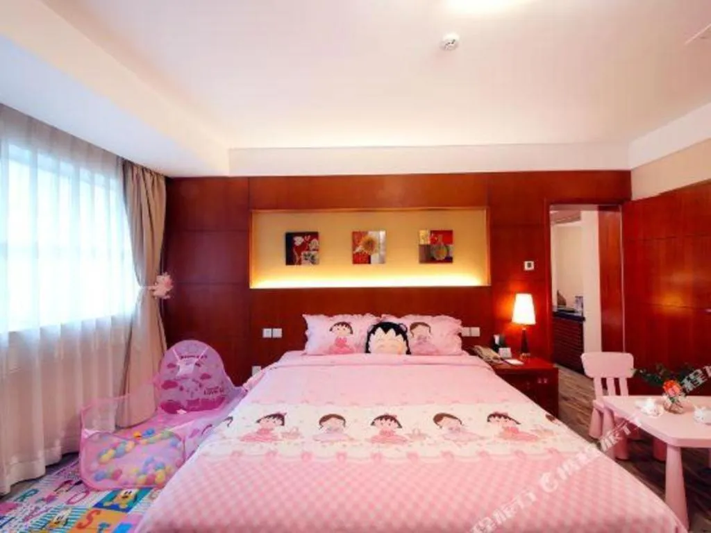 Bed in Xiamen Jingmin Central Hotel