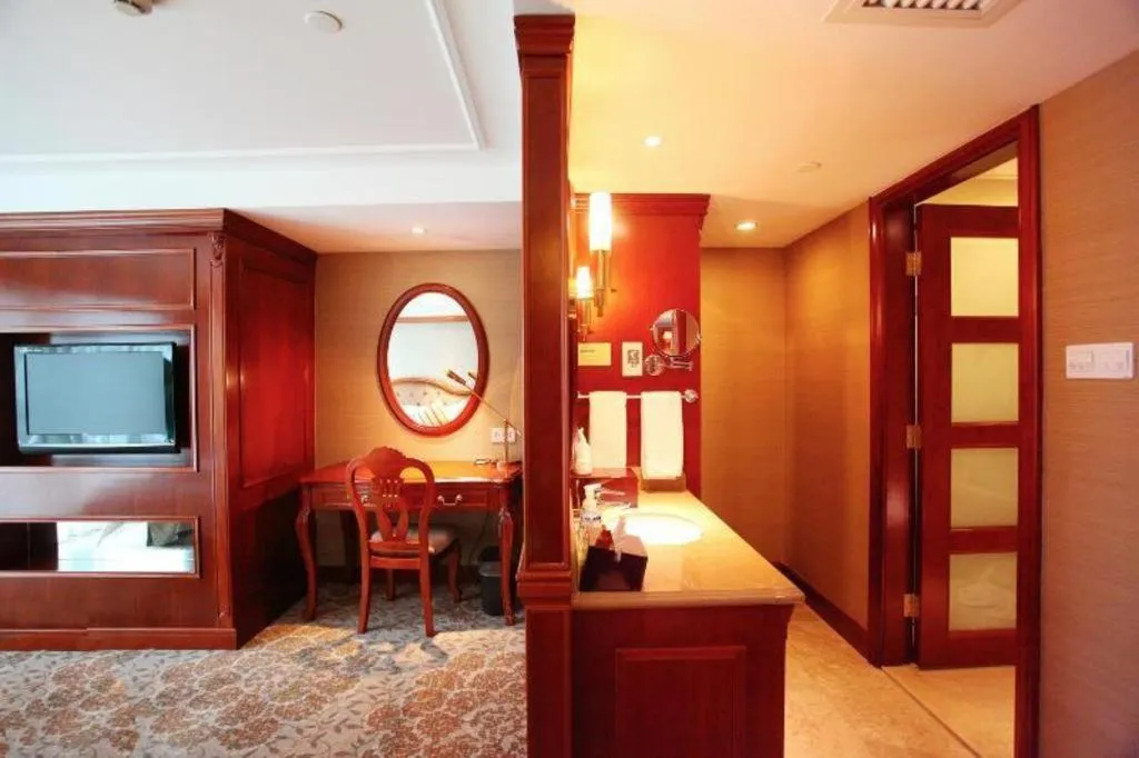 Bed in Xiamen Jingmin Central Hotel