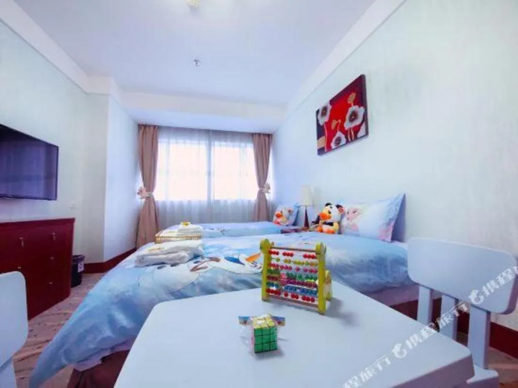 Bed in Xiamen Jingmin Central Hotel