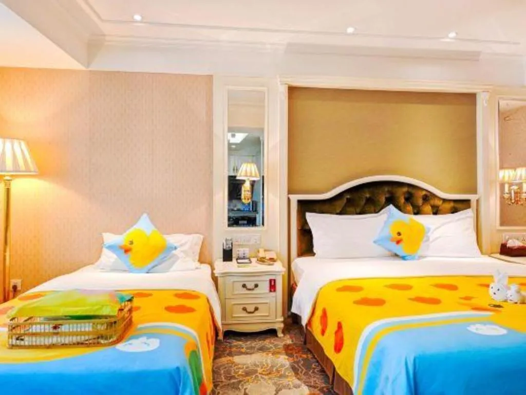 Bed in Xiamen Jingmin Central Hotel