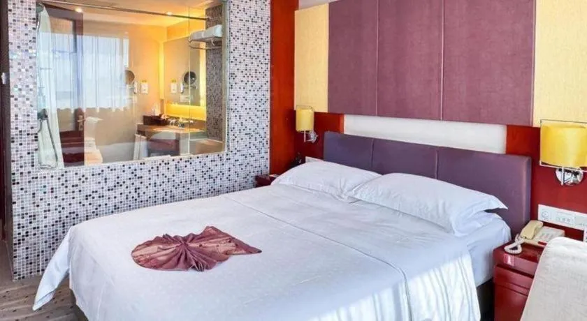 Bed in Xiamen Jingmin Central Hotel