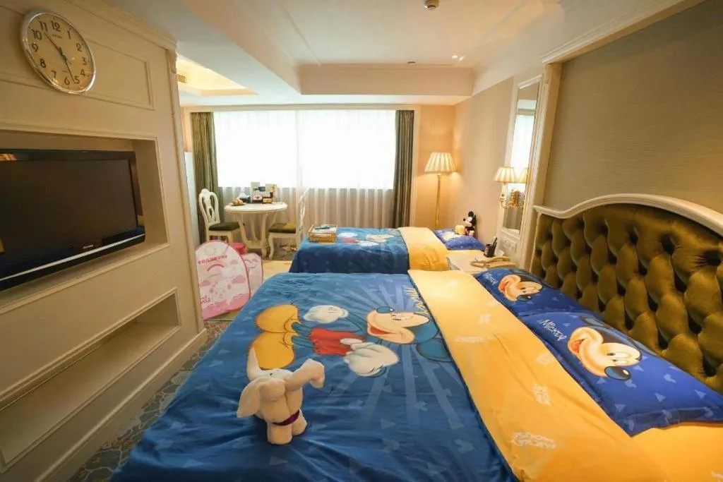 Bed in Xiamen Jingmin Central Hotel