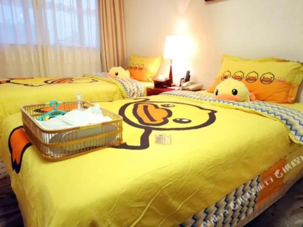 Bed in Xiamen Jingmin Central Hotel