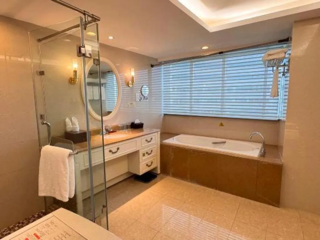 Bed in Xiamen Jingmin Central Hotel