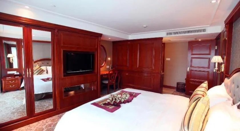 Bed in Xiamen Jingmin Central Hotel