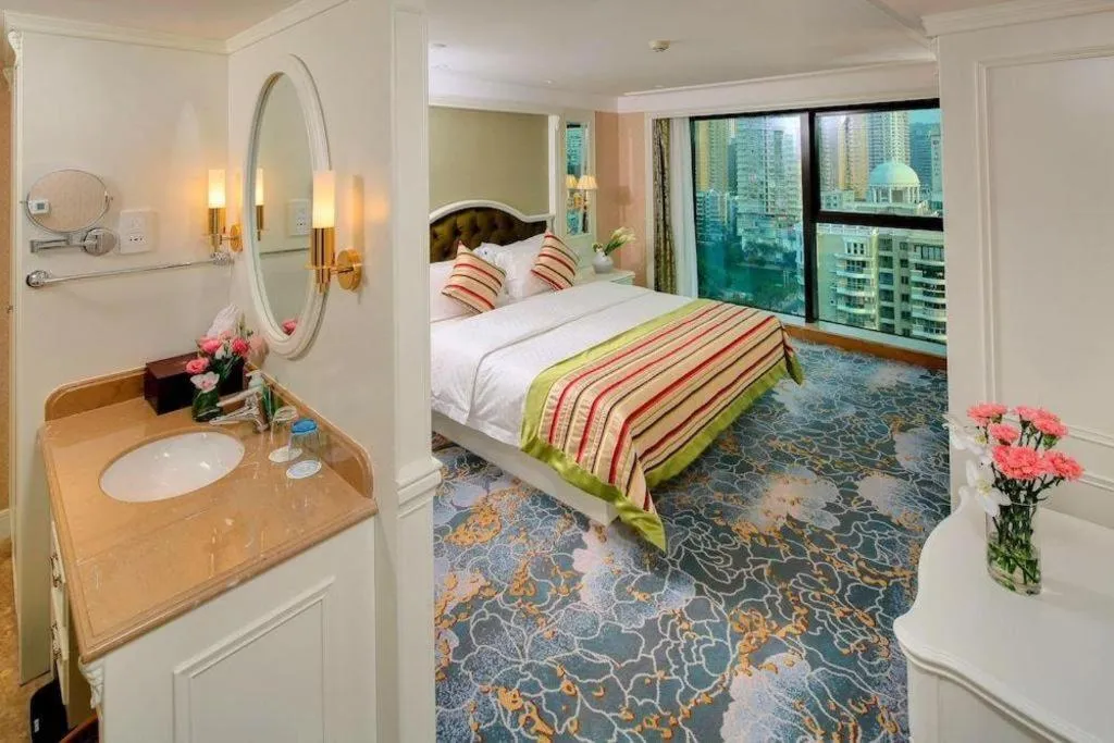 Bed in Xiamen Jingmin Central Hotel