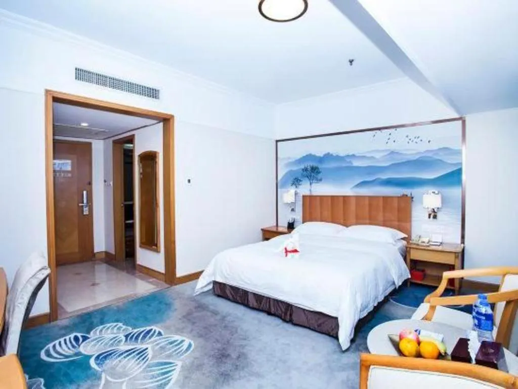 Bed in Xiamen Jingmin Central Hotel