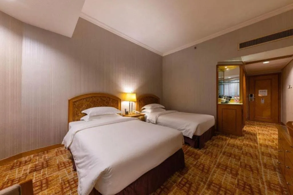 Bed in Century Plaza Hotel