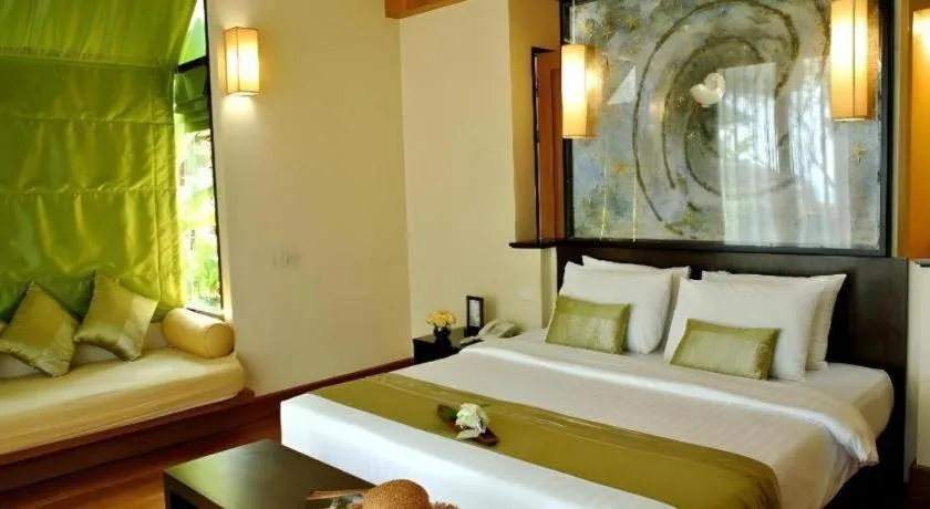 Bed in Baan Talay Dao Resort