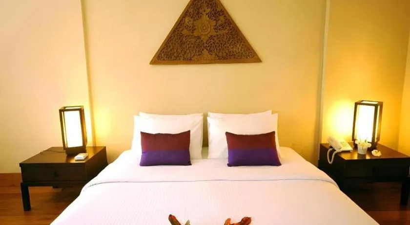 Bed in Baan Talay Dao Resort