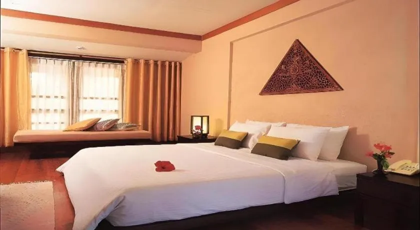 Bed in Baan Talay Dao Resort