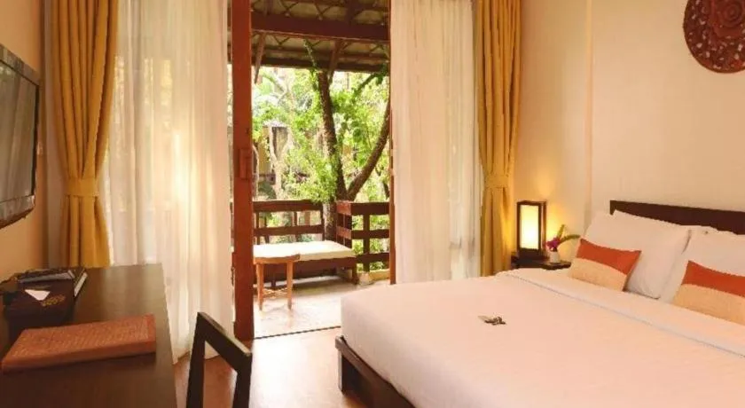 Bed in Baan Talay Dao Resort