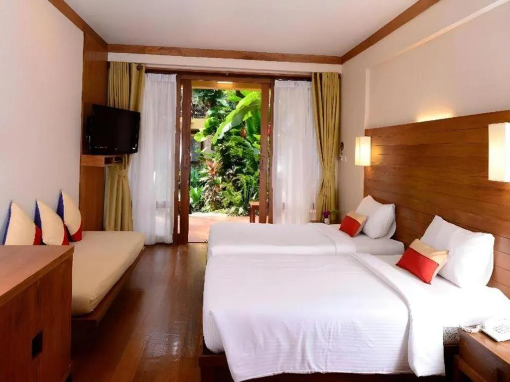 Bed in Baan Talay Dao Resort
