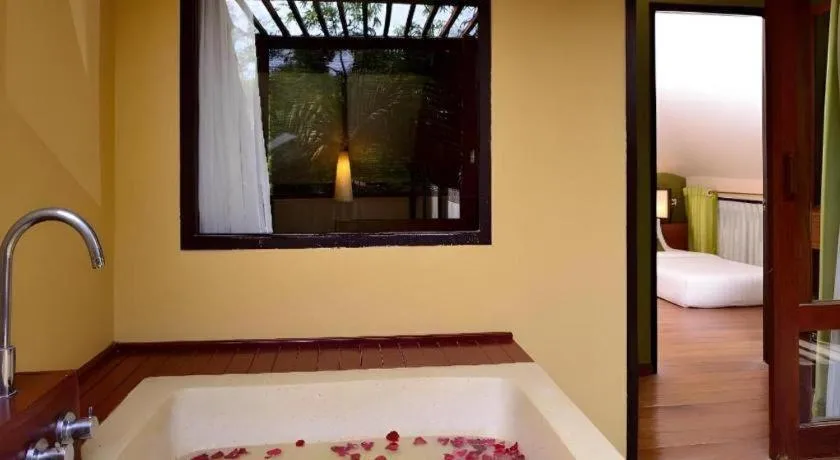 Bed in Baan Talay Dao Resort